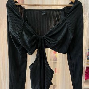 Black body suit with cut outs